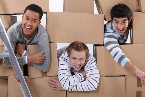 Student removals team handling a move in a Finchley residential street
