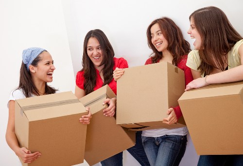 Packed office equipment and furniture prepared for relocation