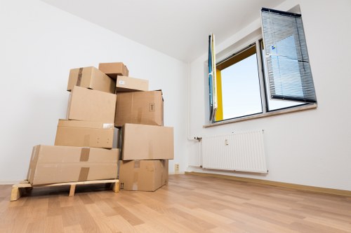 Removal van and furniture being handled carefully