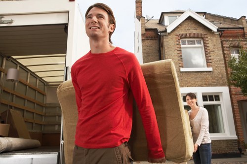 Removal van loading student belongings in Finchley