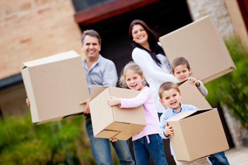 Professional movers handling household items for a Finchley relocation