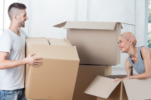 Removal van loading boxes and household items in Finchley
