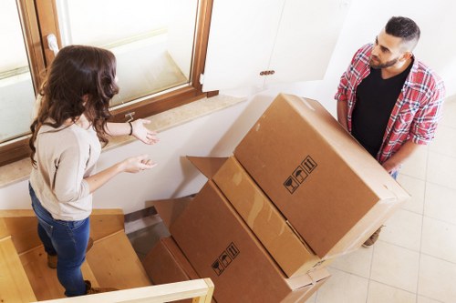 Local moving team handling furniture for a Finchley property